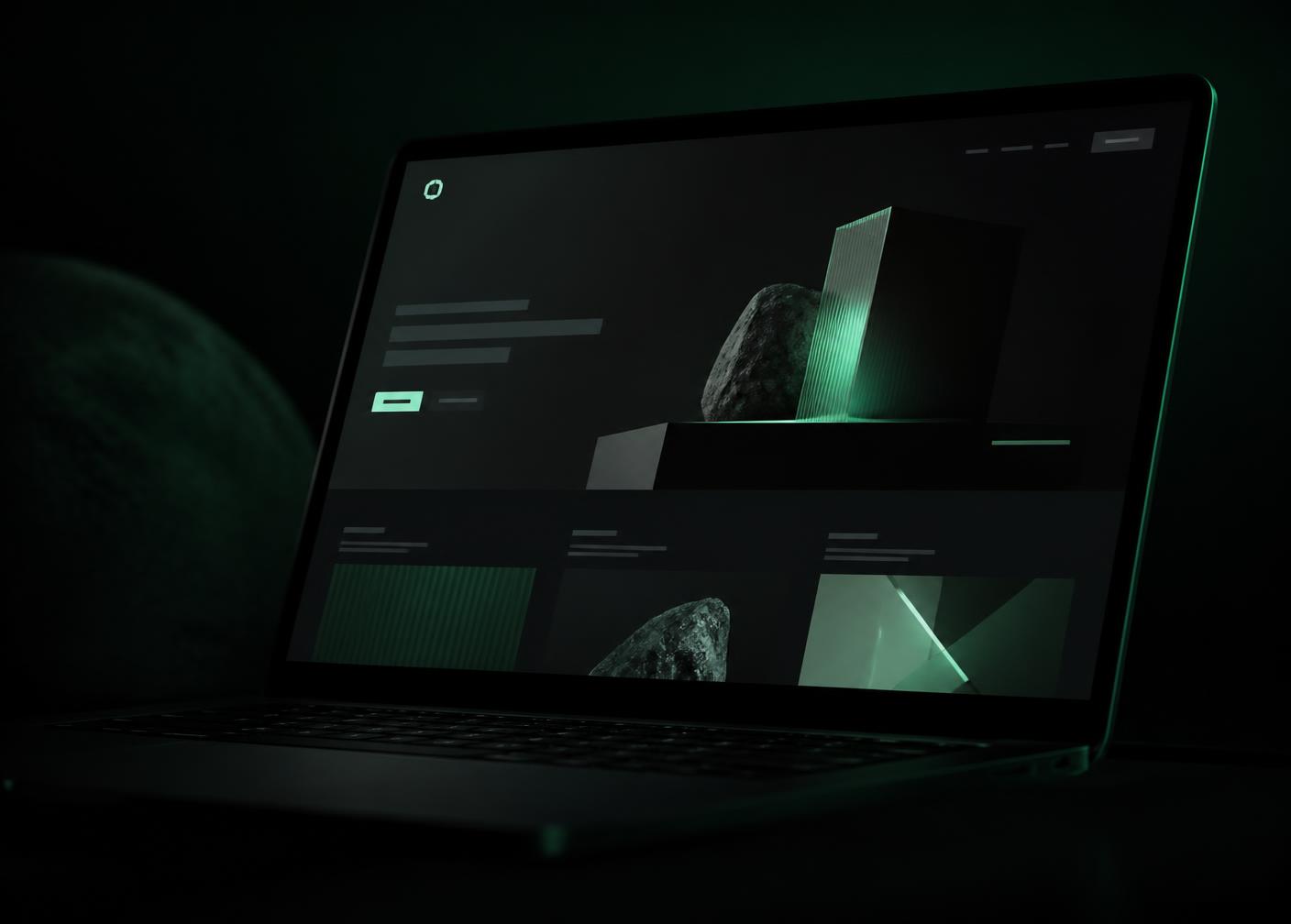 Laptop displaying a dark minimal website design